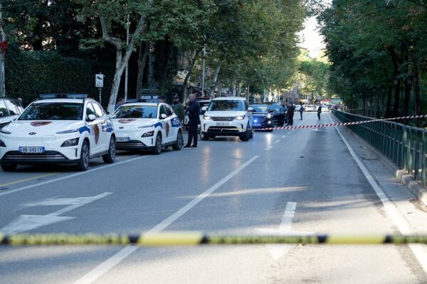 An Albanian judge was fatally shot in a courtroom, exacerbating public discontent regarding ongoing judicial reforms.