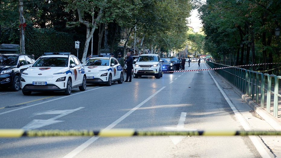 An Albanian judge was fatally shot in a courtroom, exacerbating public discontent regarding ongoing judicial reforms.
