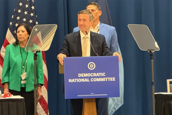 Democratic National Committee leader foresees victories in crucial gubernatorial contests, viewing them as an initial assessment of the Trump platform.