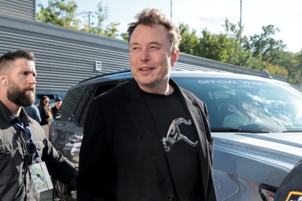 Elon Musk worries about overseeing Tesla's 'robot workforce' while the automotive business sees a minor recovery.