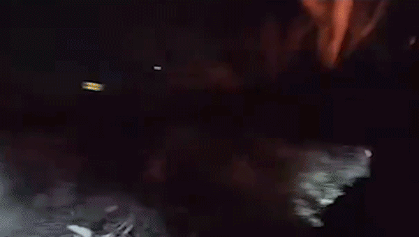 Occupant barely avoids blazing vehicle detonation while authorities quickly save confined individual