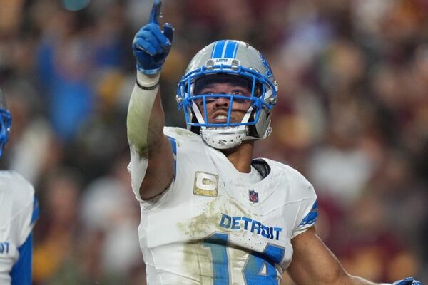 Detroit Lions' Amon-Ra St. Brown commemorates a touchdown against the Commanders by performing a dance reminiscent of Trump's signature moves.