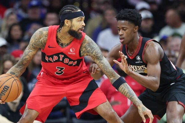 Raptors player forcefully throws water bottle to ground, inadvertently hits staff member in the face.