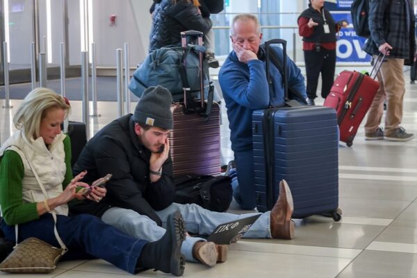 Christmas travelers left stranded as airports see mass flight cancelations, delays