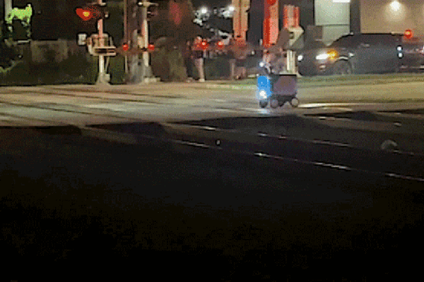 SEE IT: Video captures train smashing into food delivery robot
