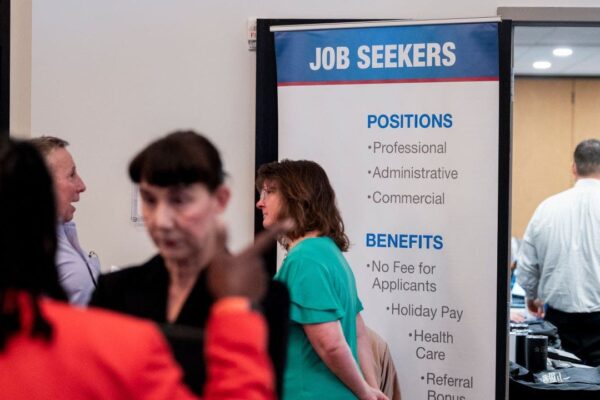 US economy added 50K jobs in December as unemployment rate declines
