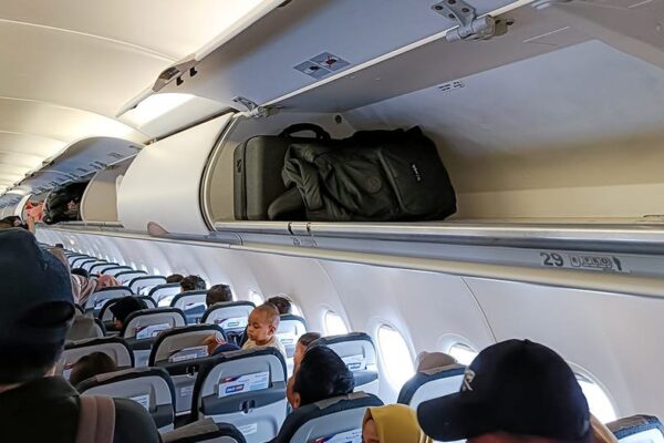 Flight passengers slam airlines for pushing early bag checks even with empty bins on board