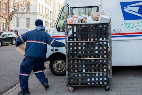 USPS halts pension contributions after warning of looming cash crisis